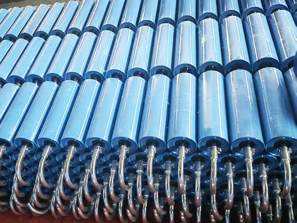 Why do idler rollers vibrate during operation?